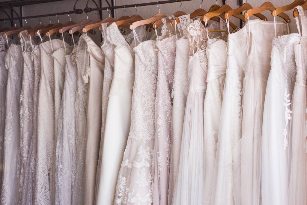 photo of wedding dresses on hangers